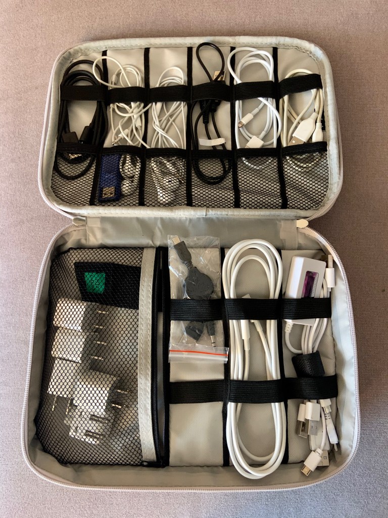 organized case of cords and cables